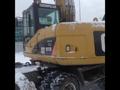 Колёсный эксковатора CAT M313D