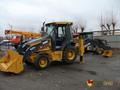 Экскаватор погрузчик John Deere 325J