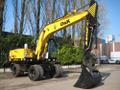 Свободен экскаватор погрузчик