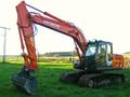 Работа гусеничного экскаватора Hitachi ZX160LC с оператором