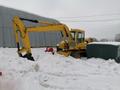 Колёсный экскаватор атек
