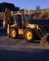Экскаватор-погрузчик NEW HOLLAND B115