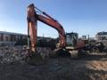 Гусеничный экскаватор 200 Hitachi